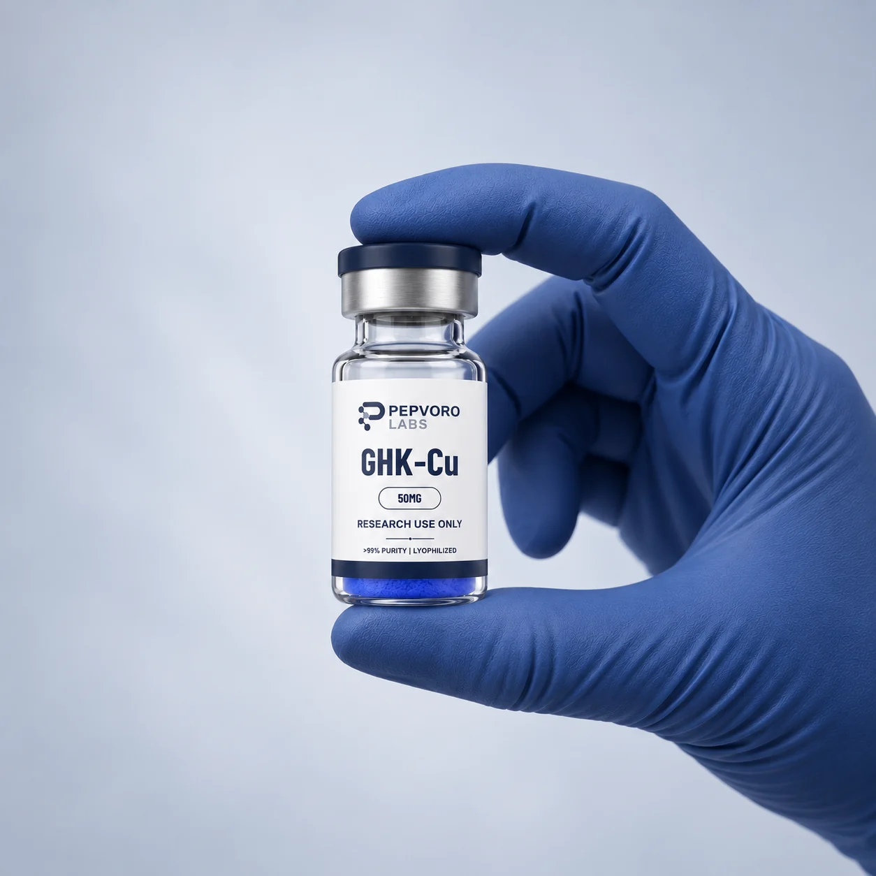 Navy laboratory glove holding a Pepvoro Labs GHK-Cu research vial